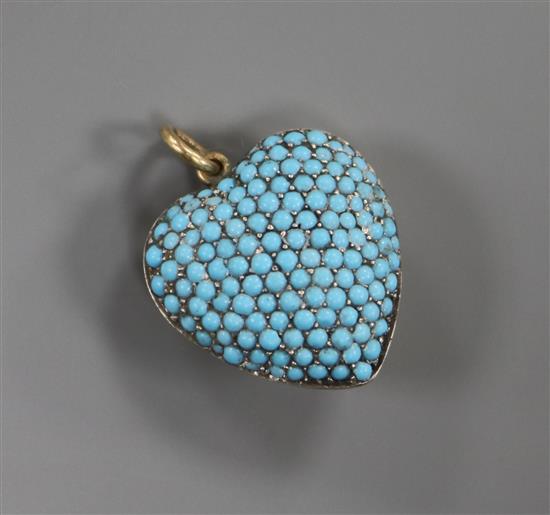A yellow metal and pave set turquoise heart shaped pendant, 20mm.